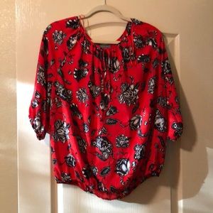 Red floral blouse